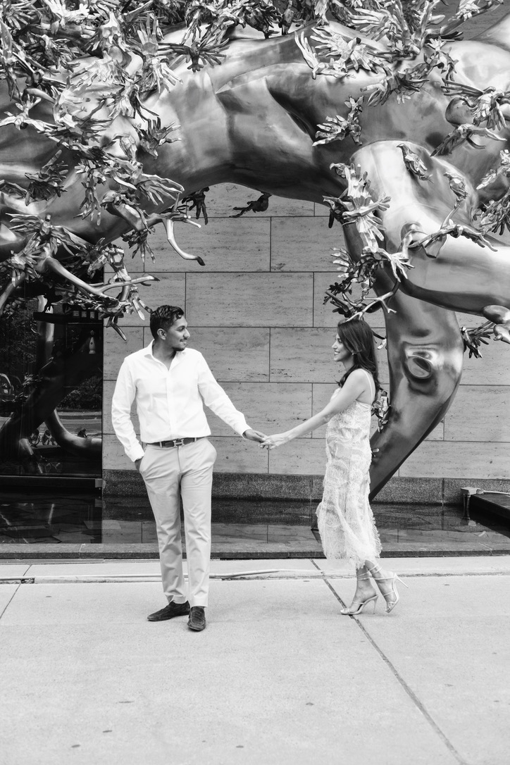 Parnia and Sachin holding hands in Toronto